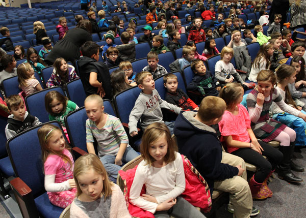 Children anxiously waiting for the show to begin